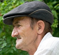 Portrait of elderly edentulous man